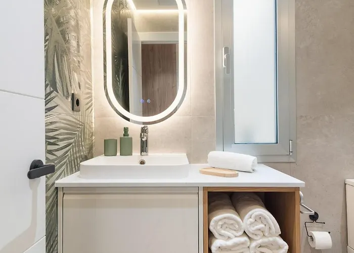 Апартаменты Home2book Stylish Beachfront Escape Аринага