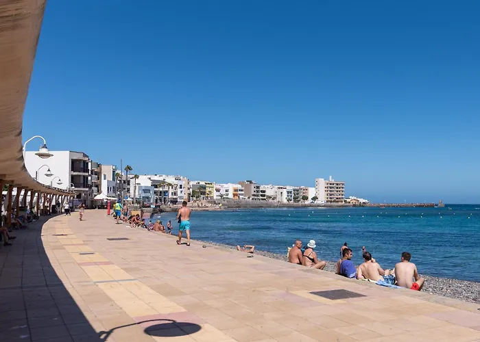 Апартаменты Home2book Stylish Beachfront Escape Аринага